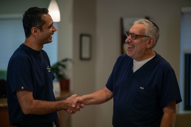 Candid photo of Dr. Vyas and Dr. Bressman